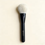 White goat hair powder brush